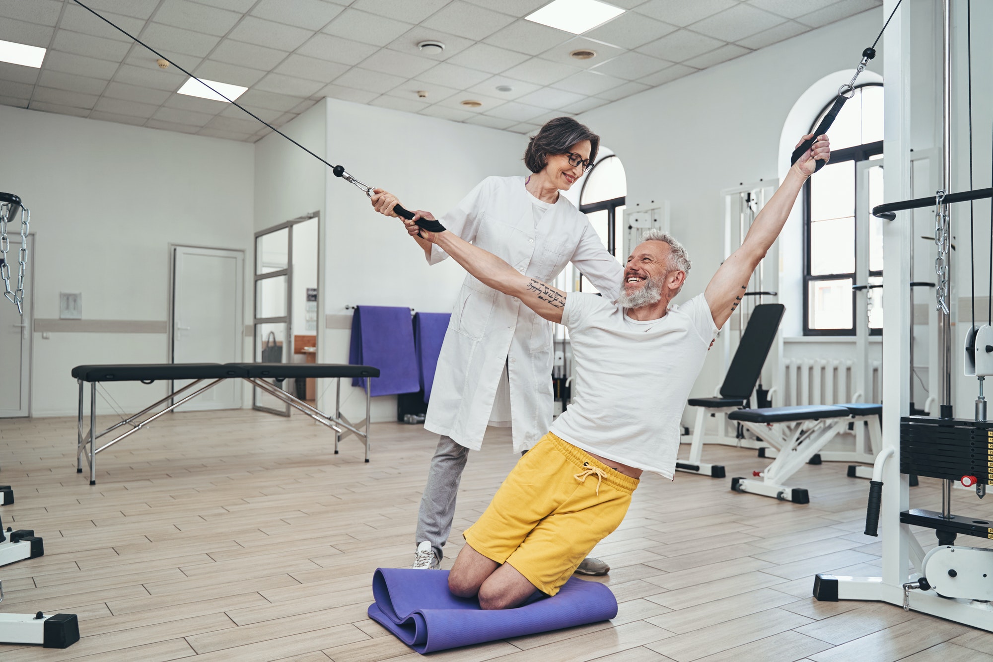 Athlete undergoing the physiotherapy session with a physiotherapist